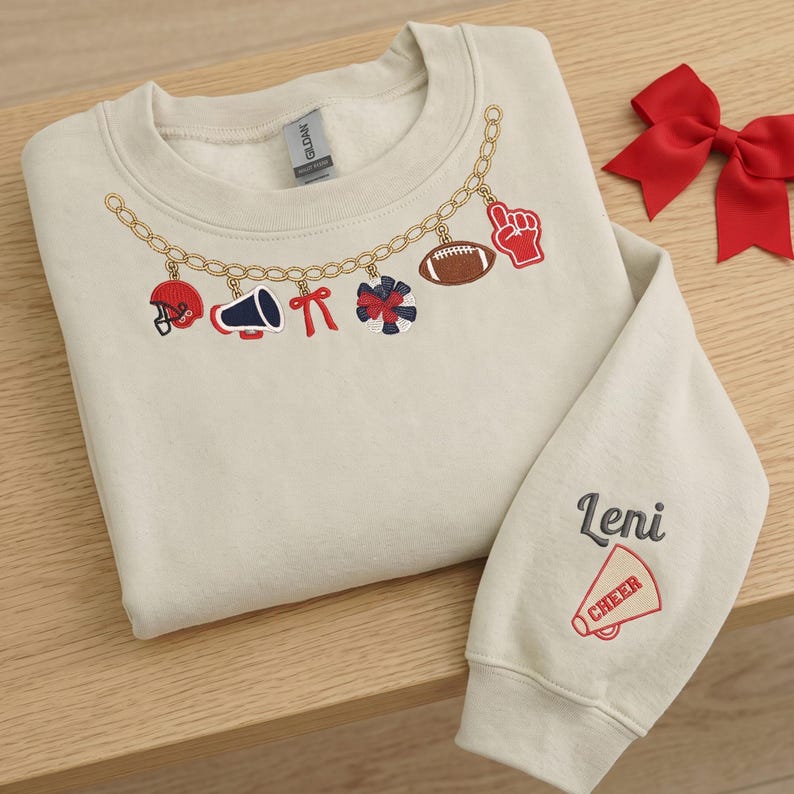 Custom Sports Charm Necklace Sweatshirt, Personalized Sleeve Name Cheer Football Crewneck, Coquette Bow Game Day Pullover