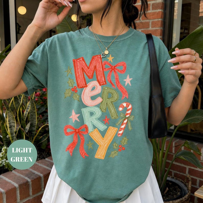 Merry Christmas Festive T-Shirt, Coquette Bow Holiday Tee, Comfort Colors Candy Cane Shirt, Trendy Xmas Gift